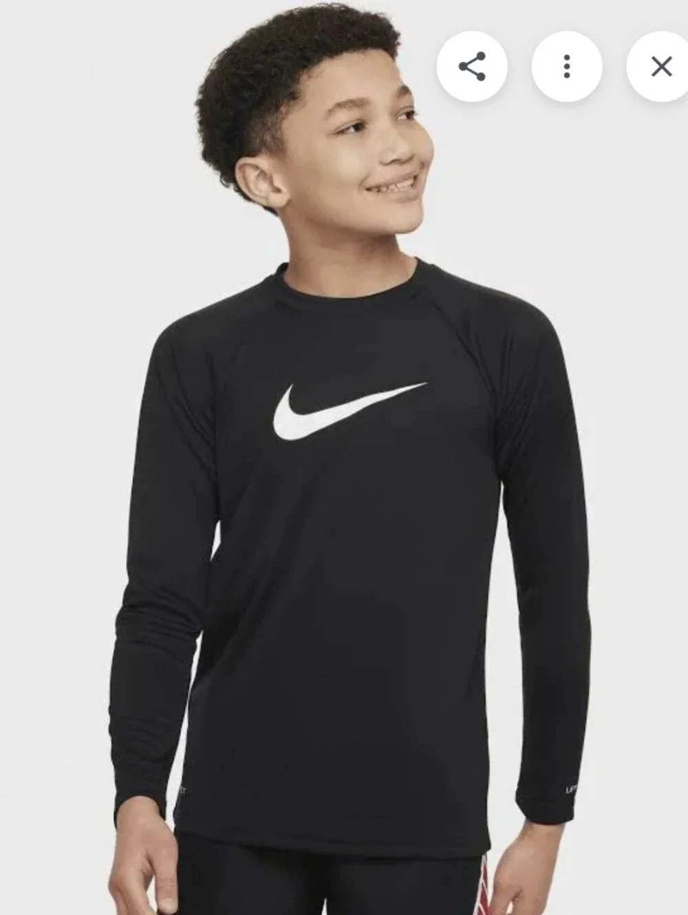 Nike Swim Dri-FIT long-sleeve Rashguard features a classic athletic crewneck